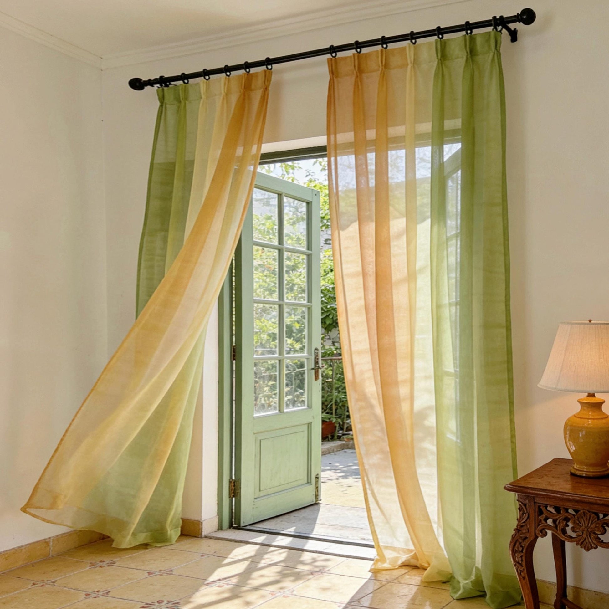 Sheer Curtain — Orange Green hung as window curtains in a bright room