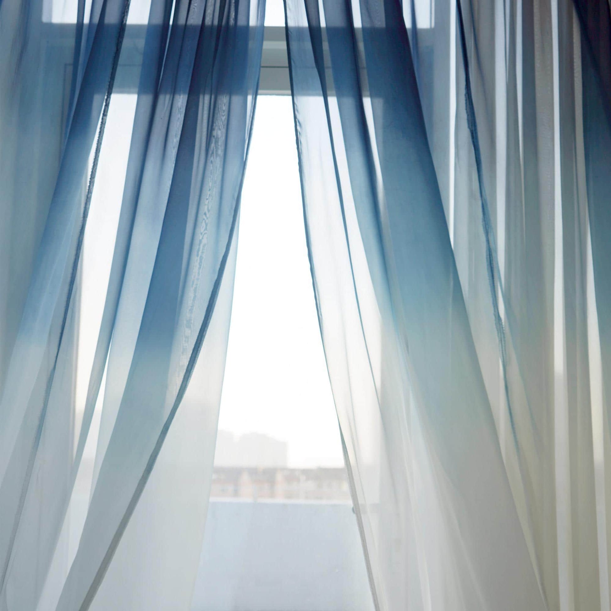 detail view of Sheer Curtain — Indigo Flow showing natural ramie texture and color