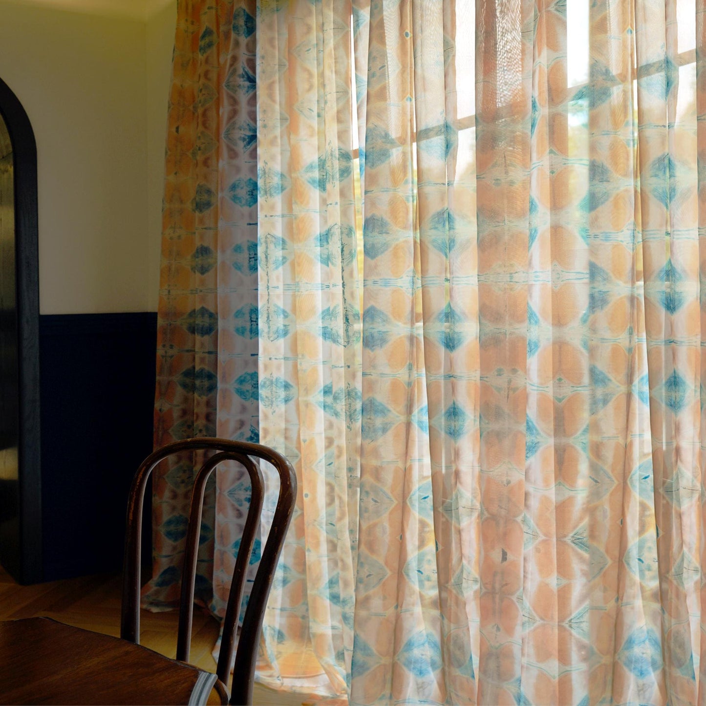 detail view of Pattern Drapery — Soft Beige showing plant-dyed pattern and sheer drape
