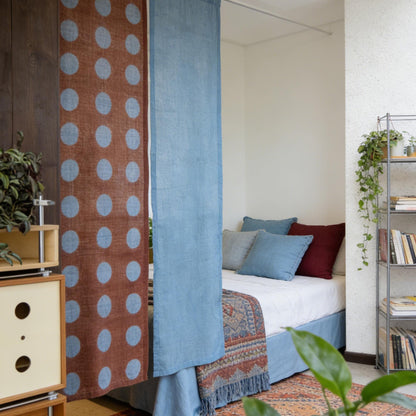 detail view of Polka Dot Linen Noren — Rust / Blue showing plant-dyed linen texture and pattern