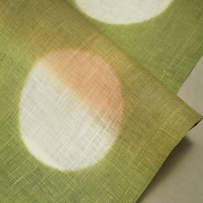close-up of Polka Dot Linen Noren — Golden / Green showing the natural resist-dye motif on linen