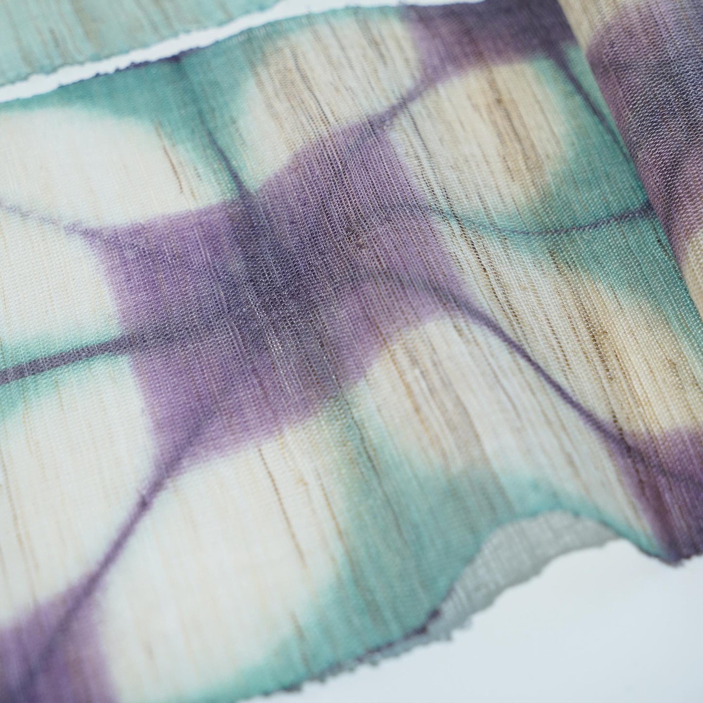 flat-lay of Narrow Ramie — Field Grid showing the long narrow form and pattern