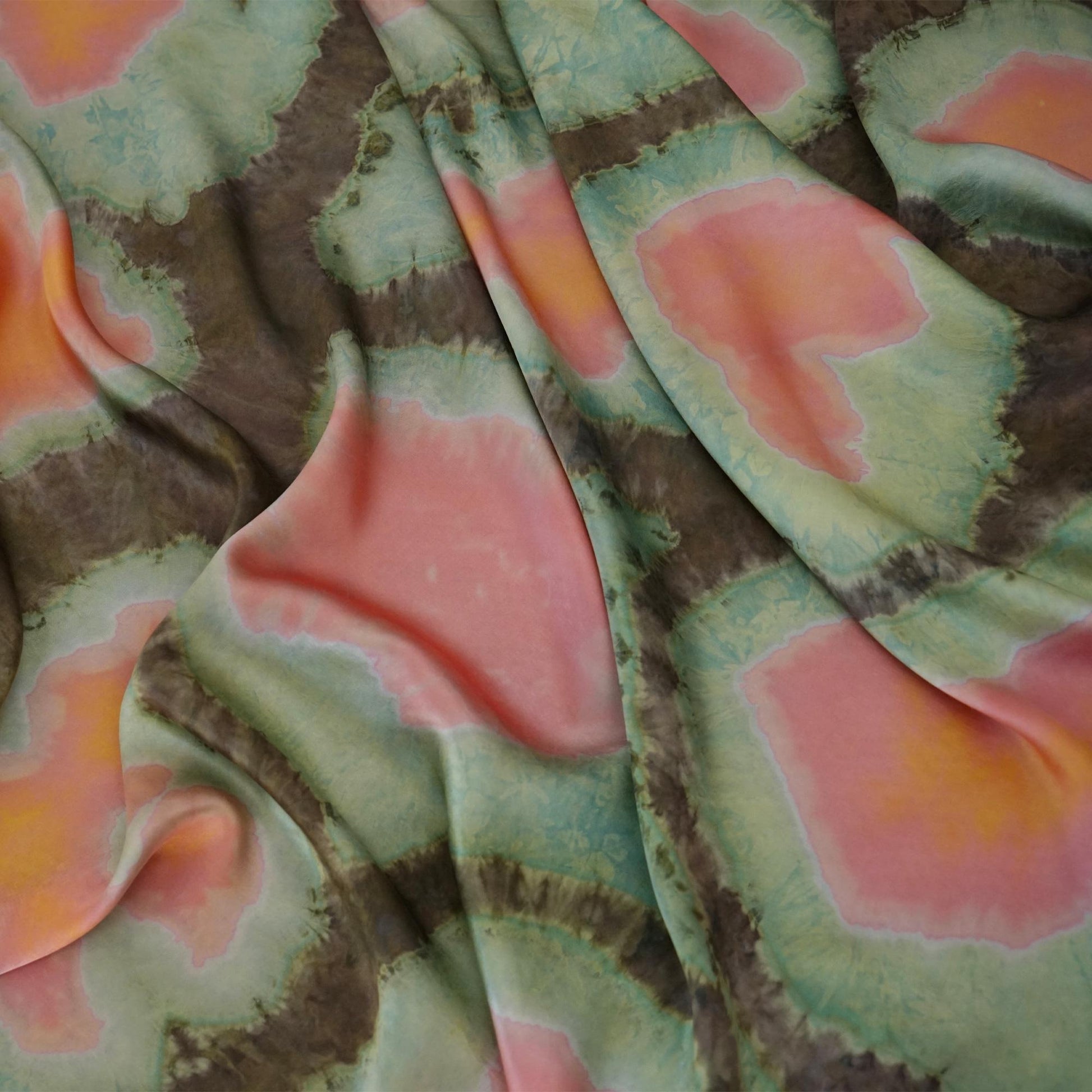 fabric detail of Scarf — Clay Green showing hand-dyed texture and drape