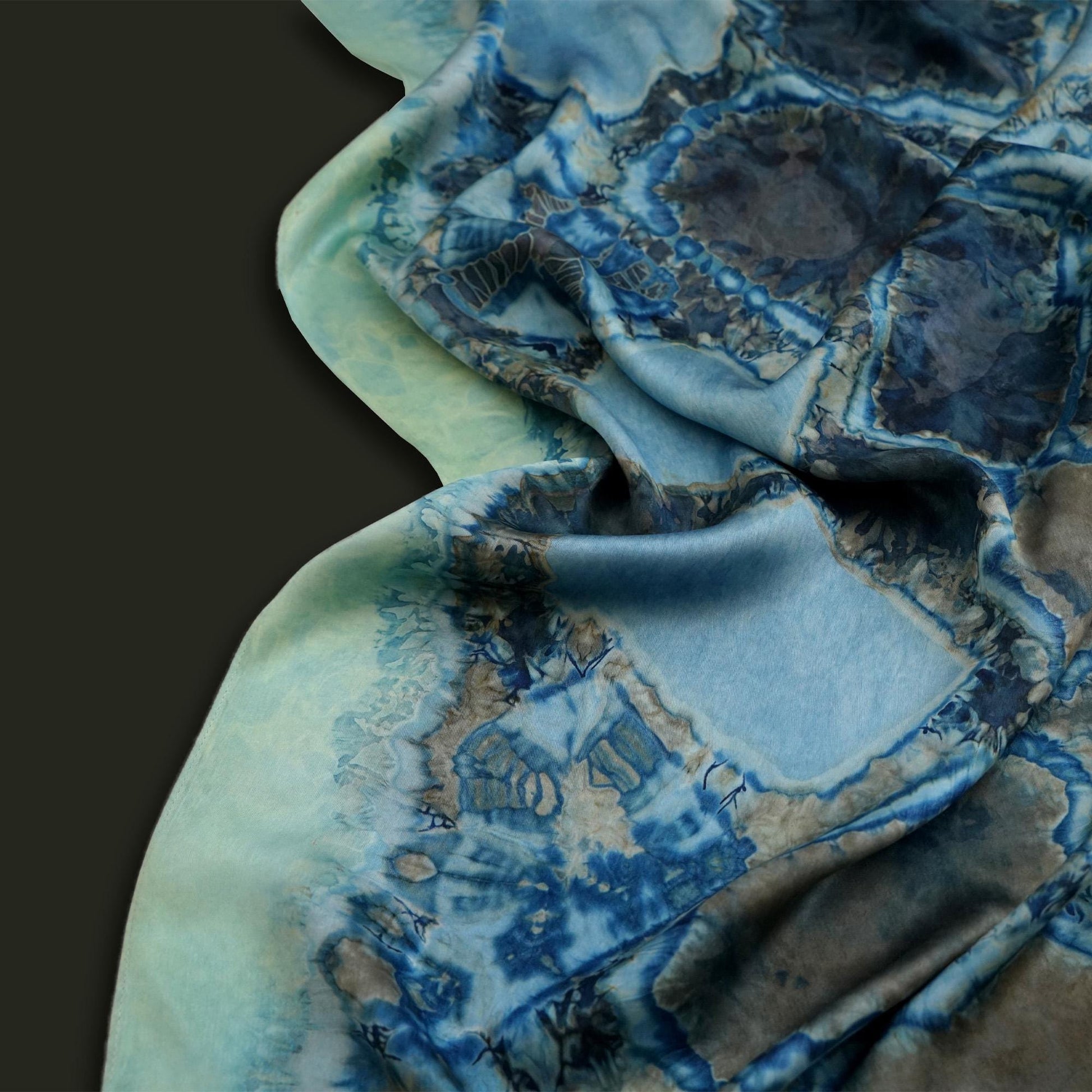 close-up of Scarf — Deep Teal showing the soft weave and botanical color