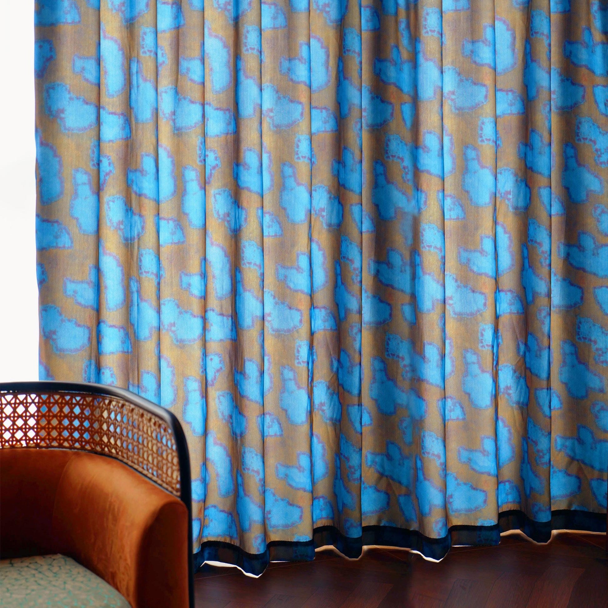 lifestyle scene with Pattern Drapery — Deep Blue creating a soft, airy room partition