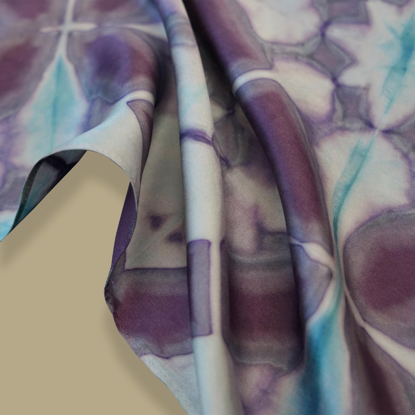 close-up of Scarf — Mauve Knot showing the soft weave and botanical color