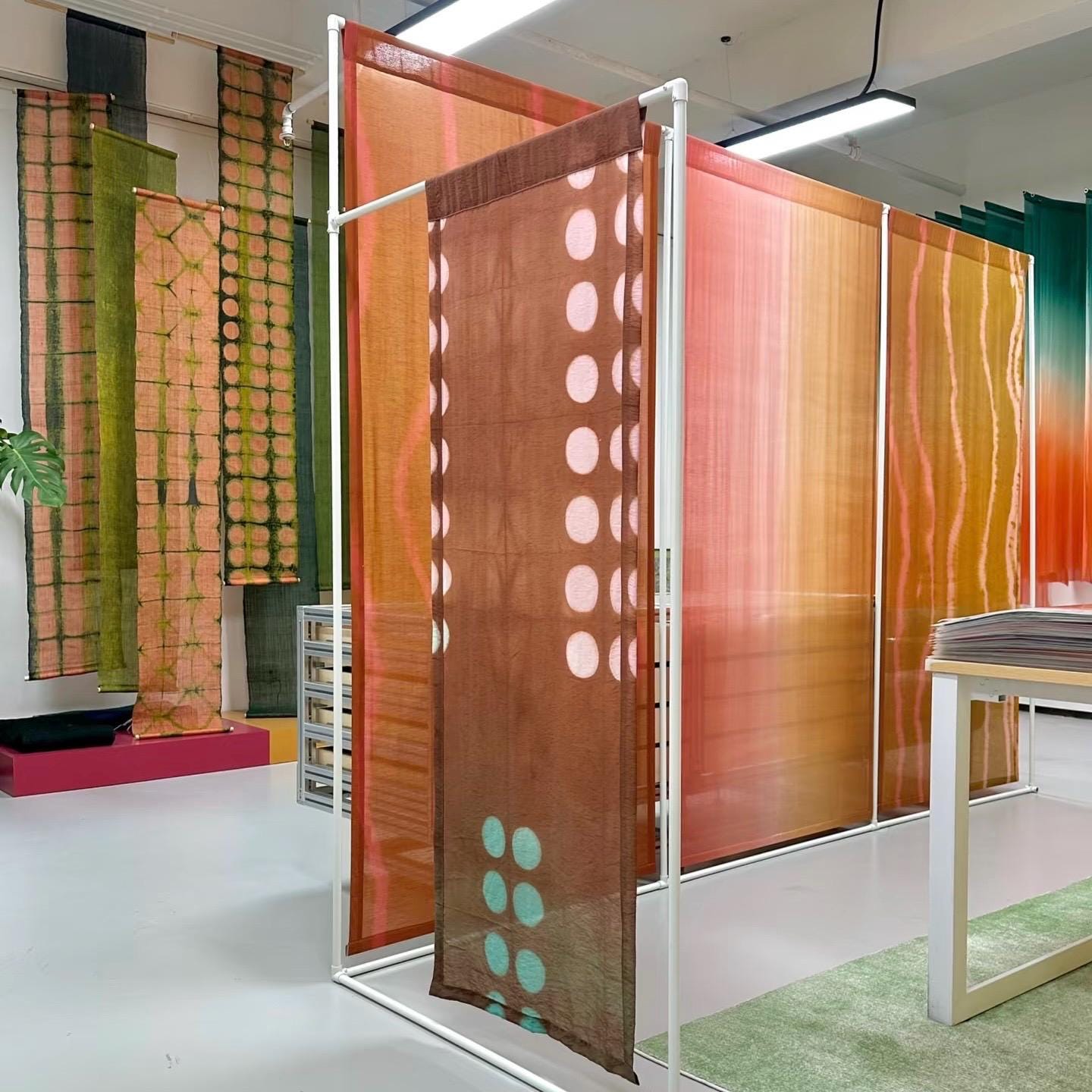 room scene with TESTlinen used as sheer curtains in a living space