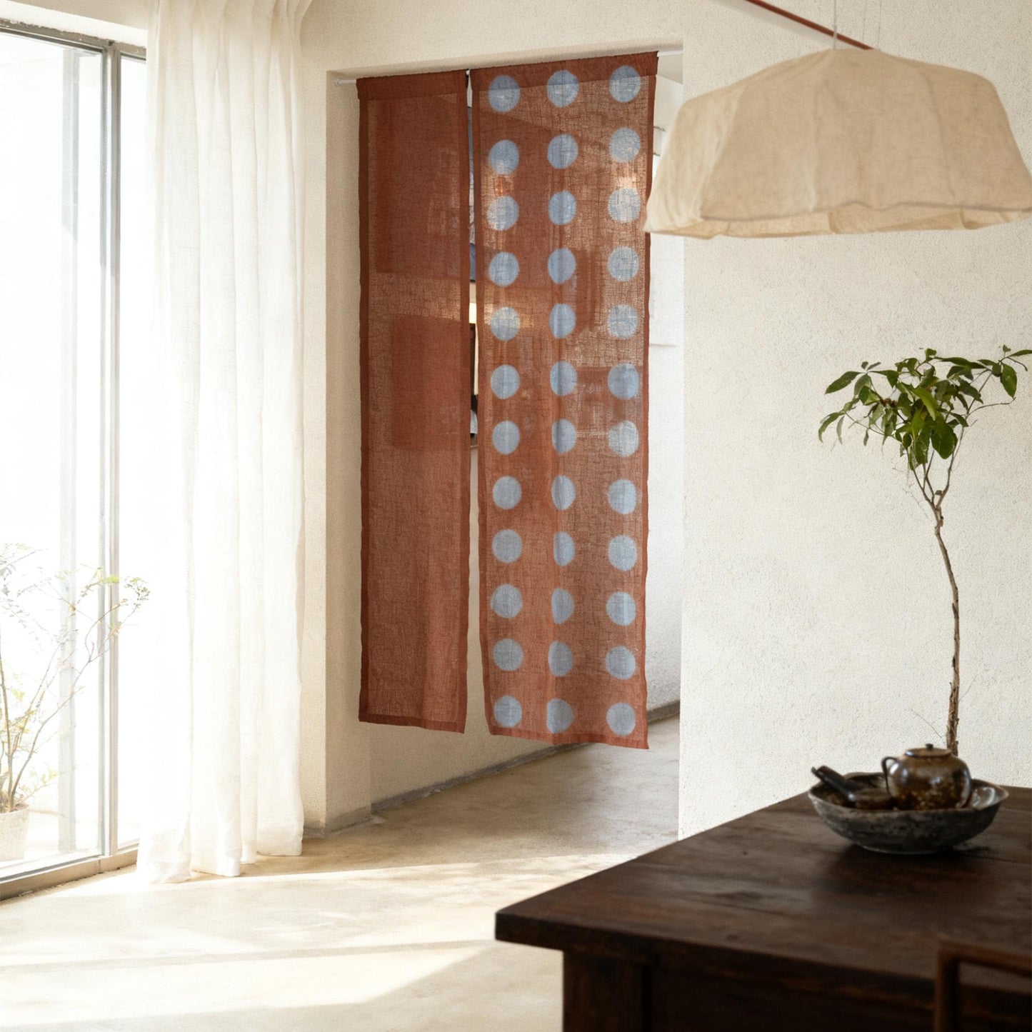detail view of Polka Dot Linen Noren — Brick / Red showing plant-dyed linen texture and pattern
