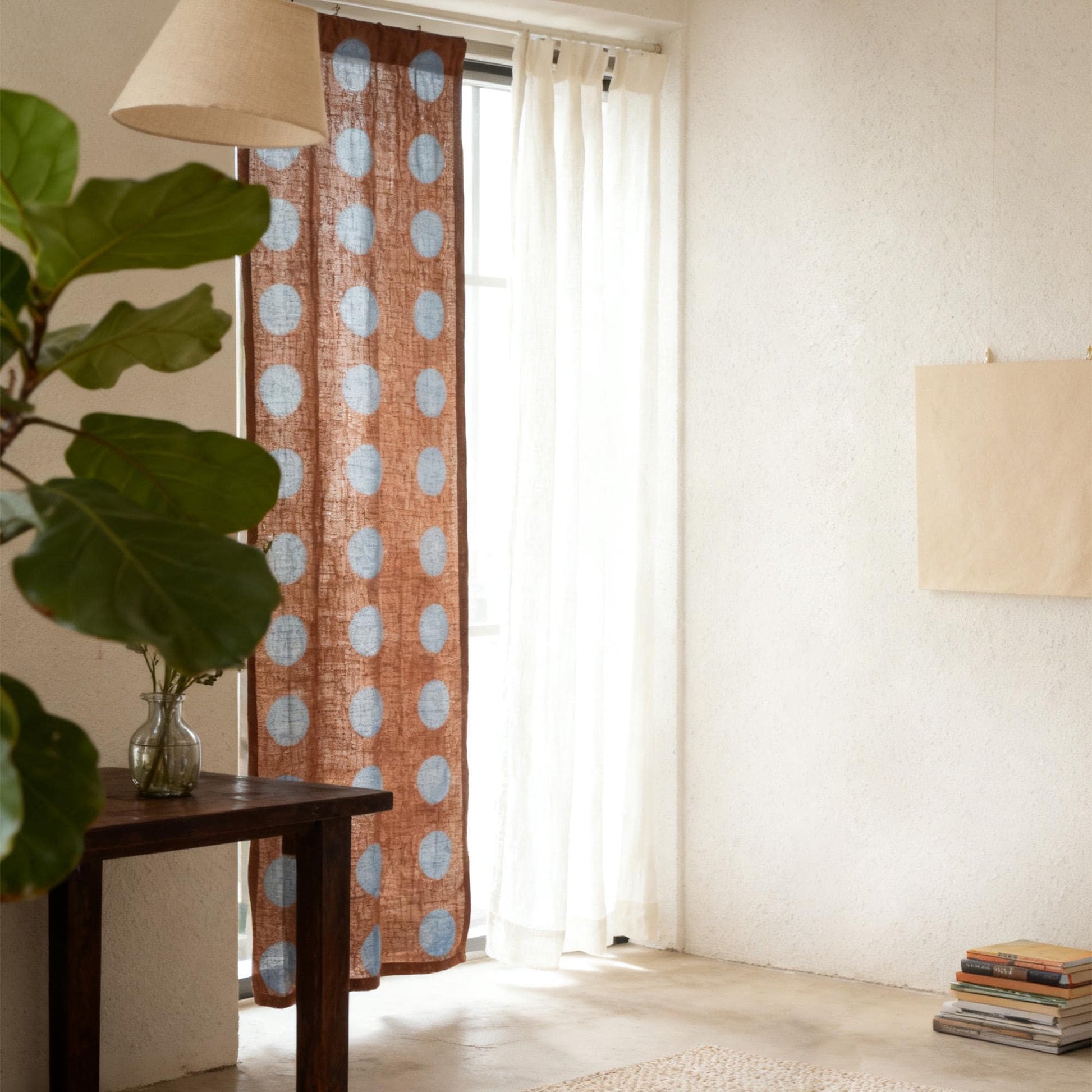 close-up of Polka Dot Linen Noren — Brick / Red showing the natural resist-dye motif on linen