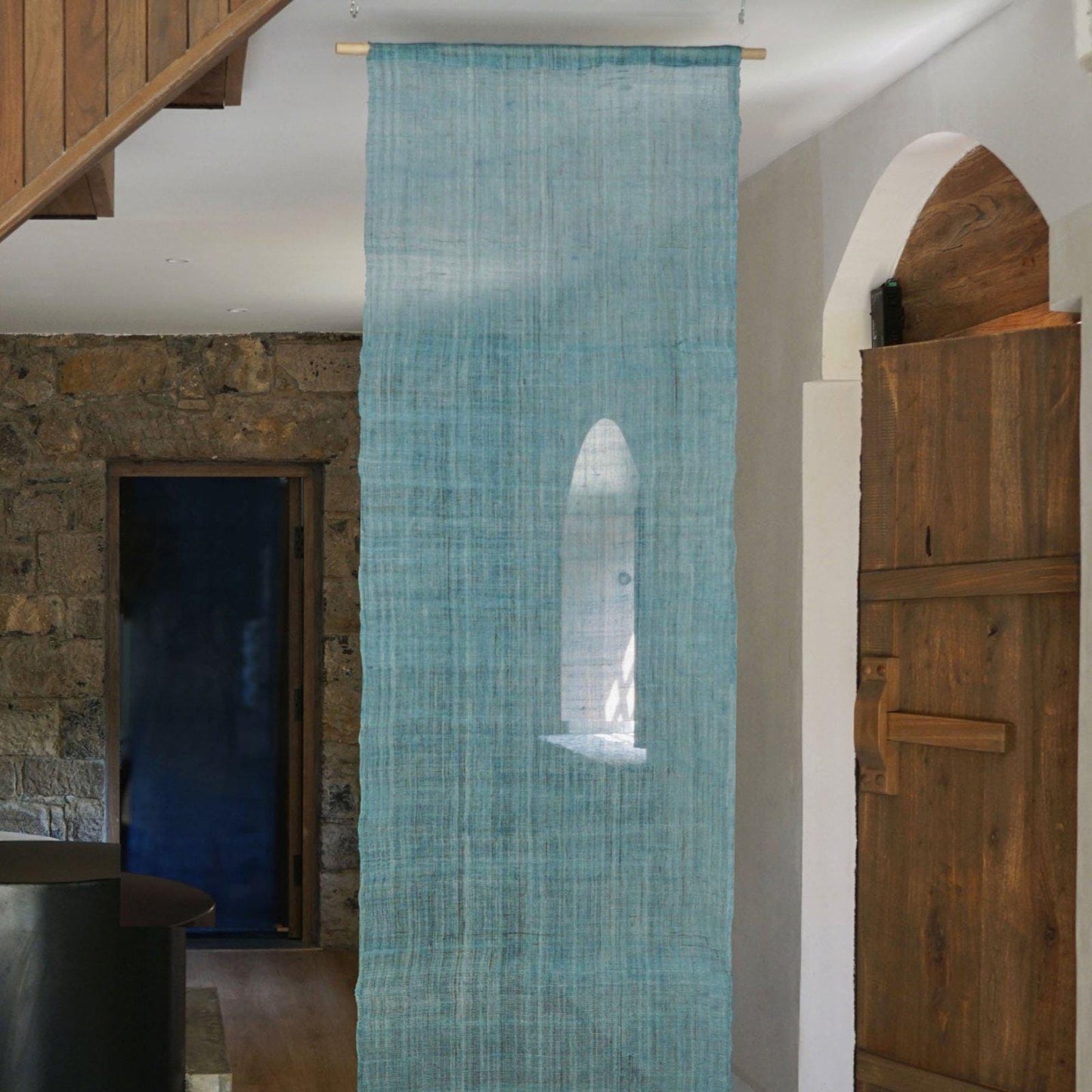 room scene featuring Ramie Ombre — Deep Blue hung by a window or doorway