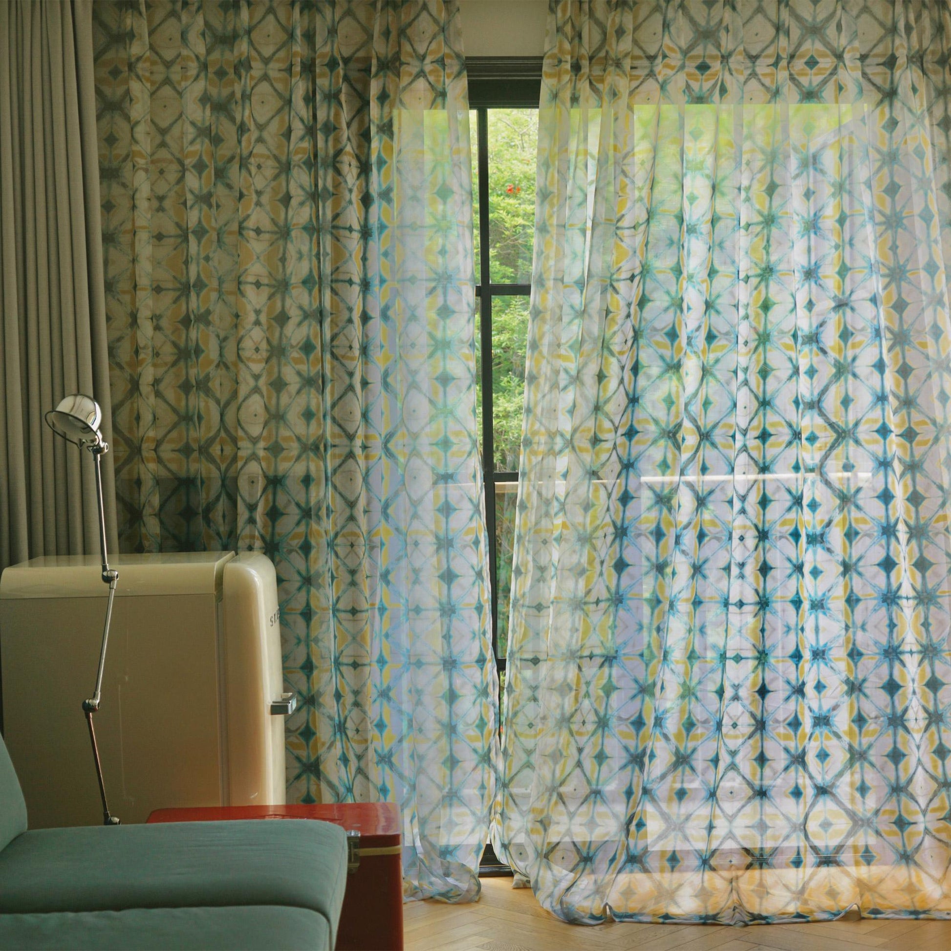 Pattern Drapery — Moss Yellow shown in a bedroom interior with soft natural light