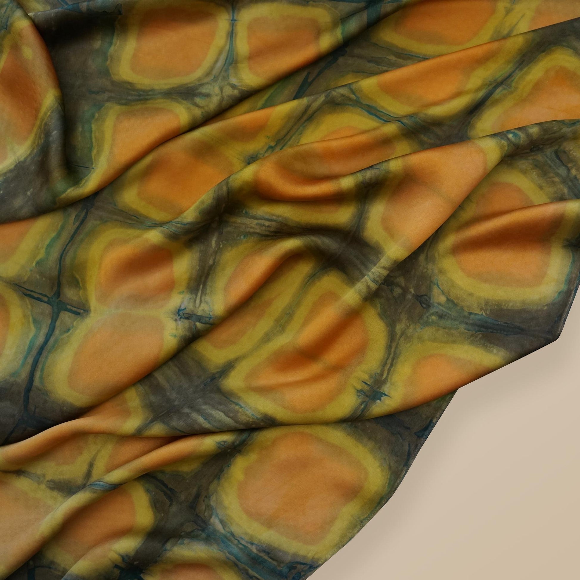 close-up of Scarf — Amber Green showing the soft weave and botanical color