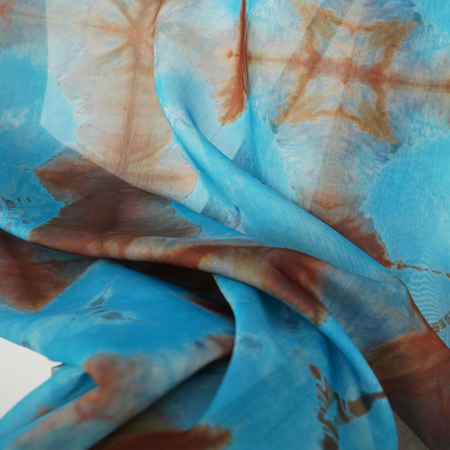 detail view of Pattern Drapery — Red Blue showing plant-dyed pattern and sheer drape
