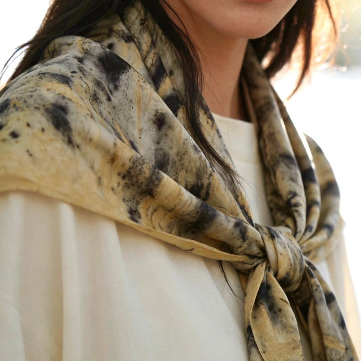 flat-lay view of Scarf — Ochre Vine highlighting the natural dye and motif