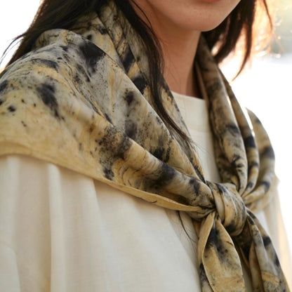 flat-lay view of Scarf — Ochre Vine highlighting the natural dye and motif
