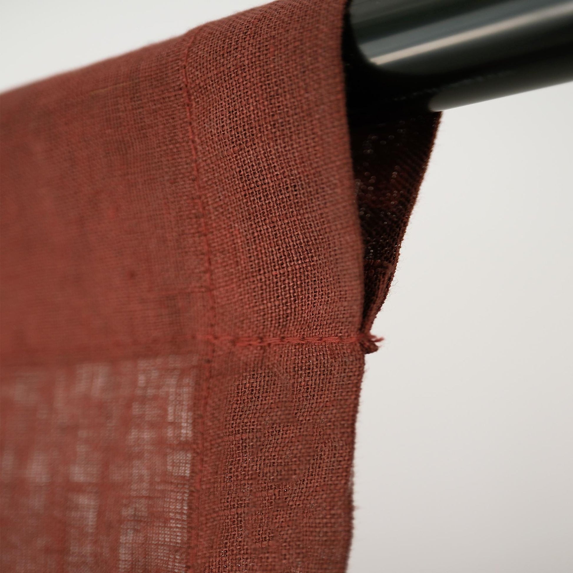 styled room scene with Soft Tone Noren — Dusty Rose used as a window or doorway curtain