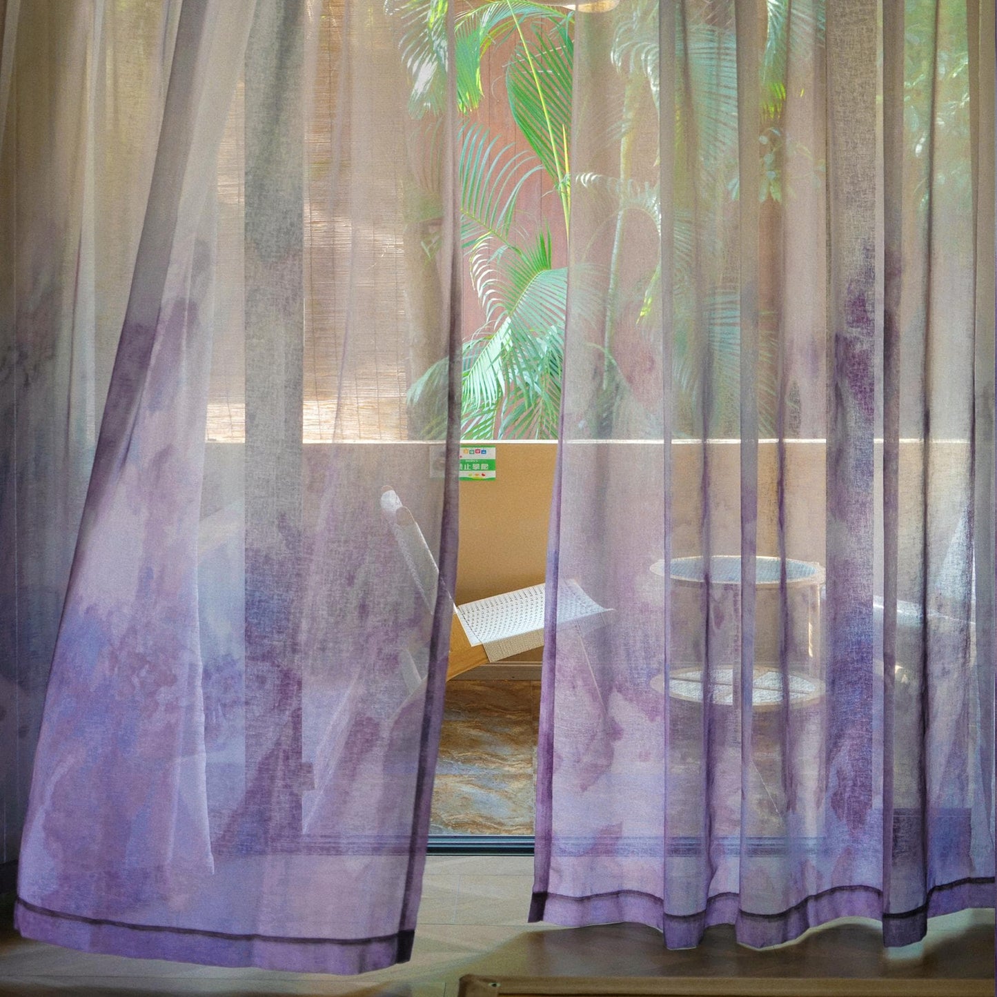 detail view of Pattern Drapery — Purple Haze showing plant-dyed pattern and sheer drape