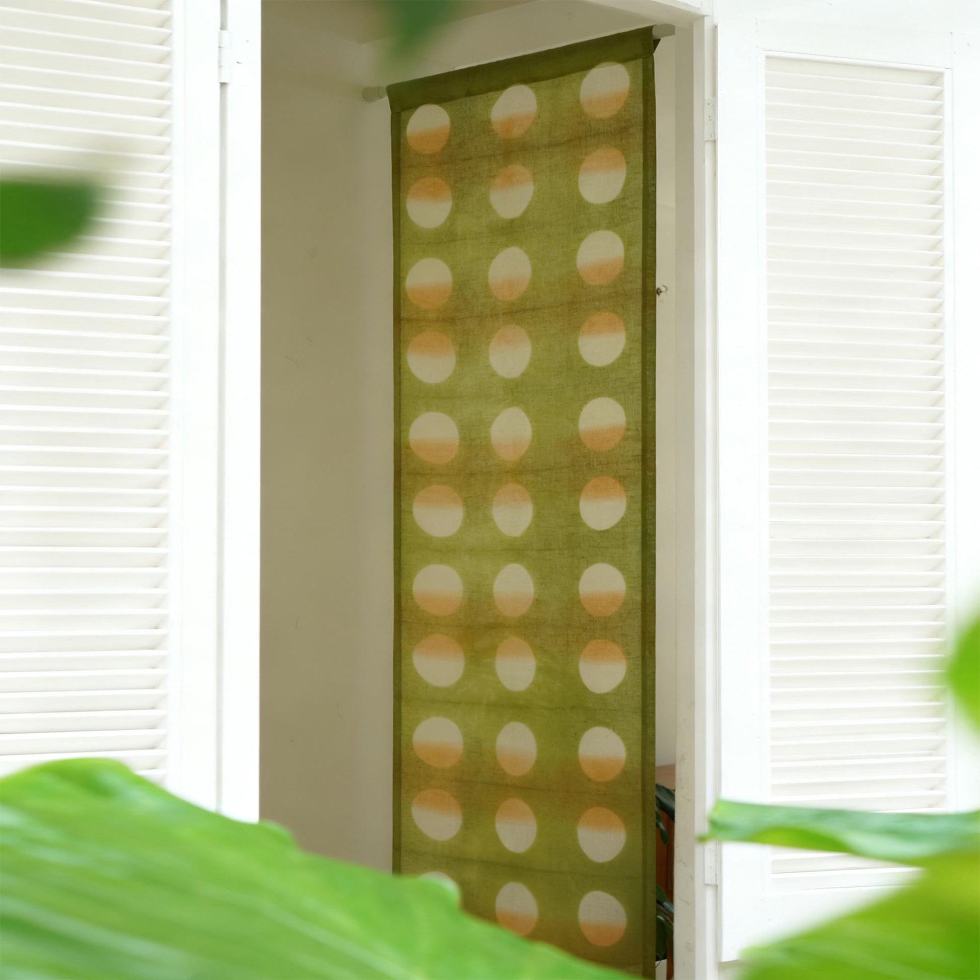 styled room scene with Polka Dot Linen Noren — Orange / Yellow used as a window or doorway curtain