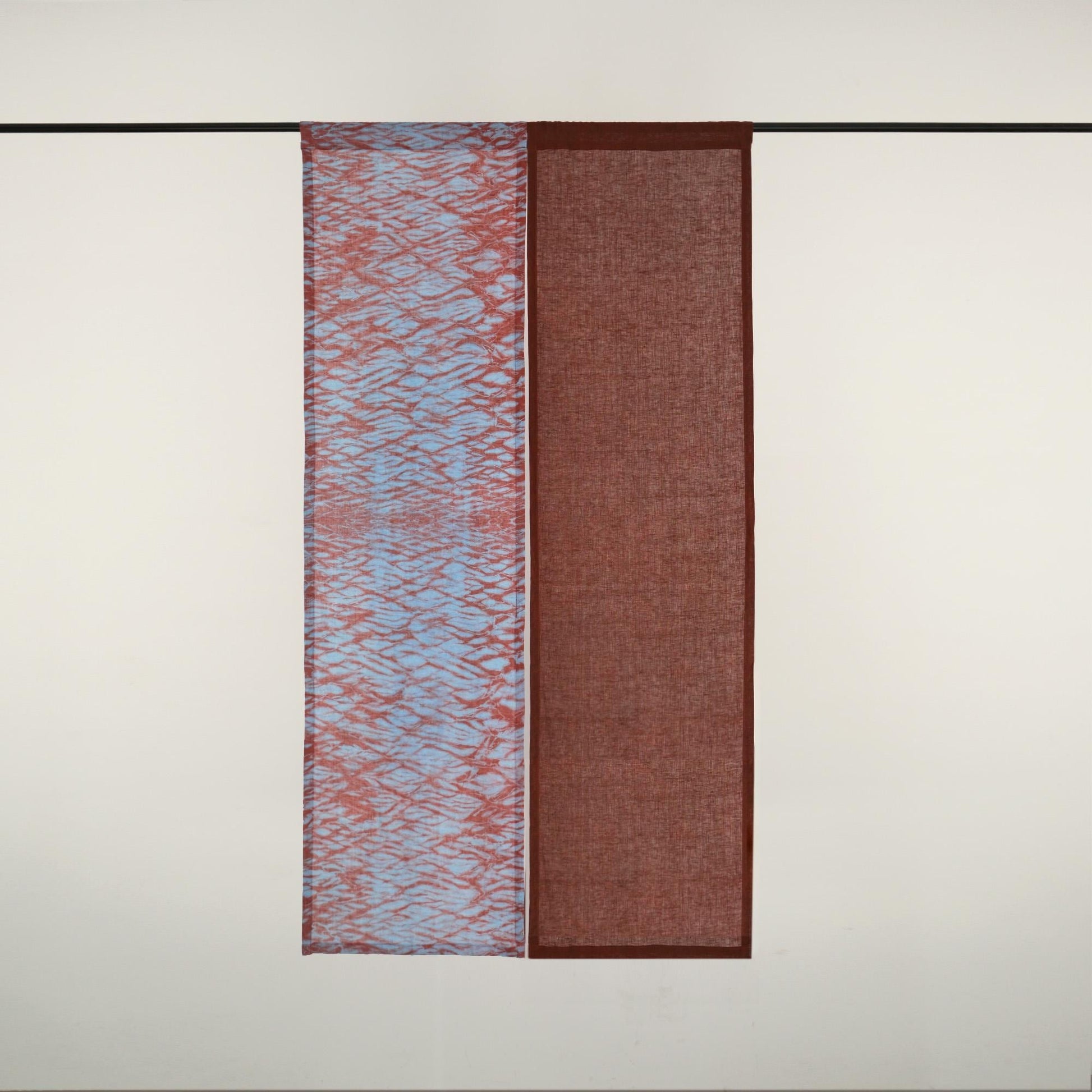 Plant-dyed linen noren 'Mist Red' — handmade Japanese doorway curtain with botanical motif.