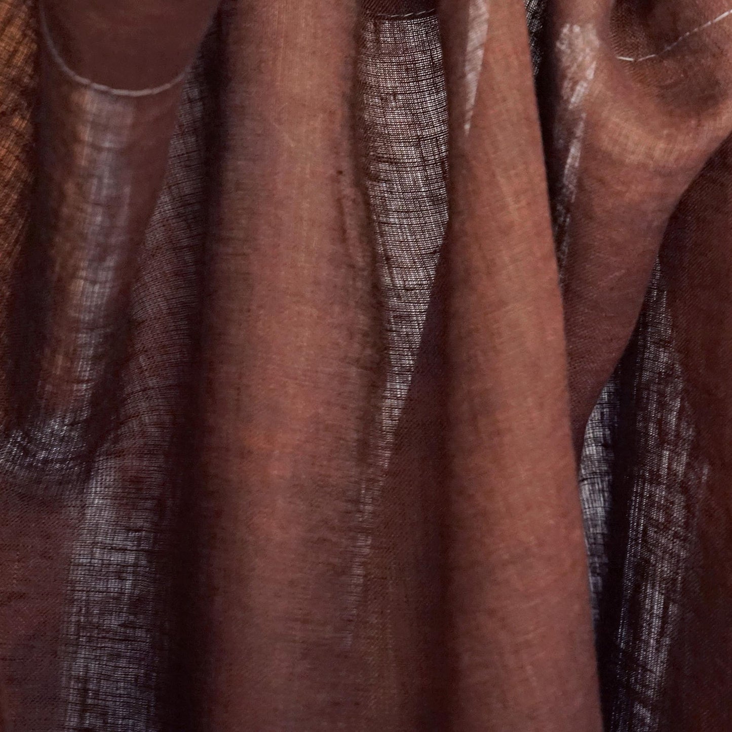 Linen Panel — Crimson Blue hanging by a window, filtering daylight in a styled interior
