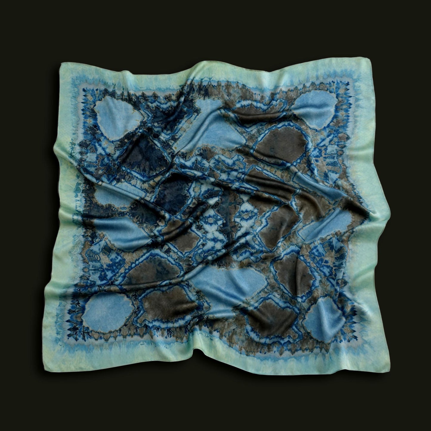 Scarf — Deep Teal styled and worn, showing the natural plant-dyed pattern