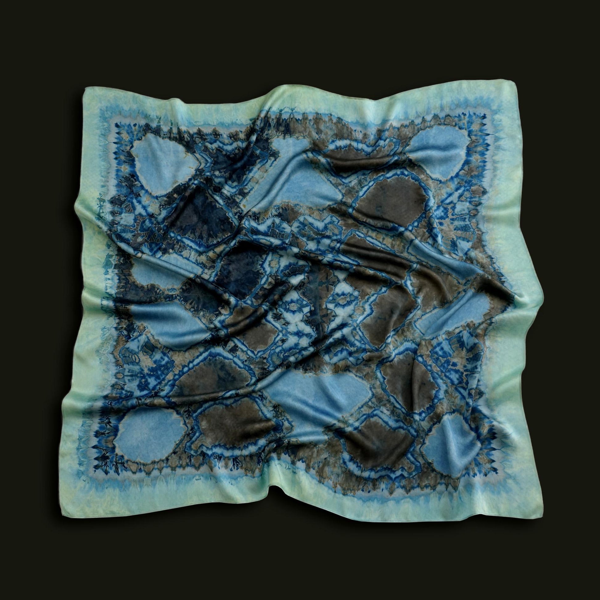 Scarf — Deep Teal styled and worn, showing the natural plant-dyed pattern