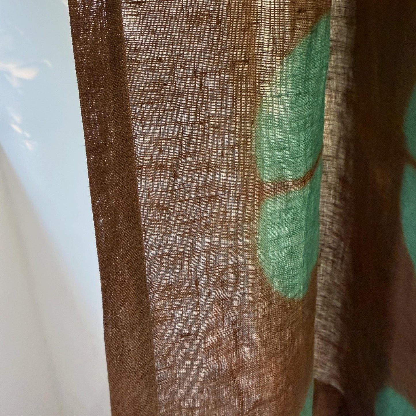 styled room scene with Motif Linen Noren — Amber Grid used as a window or doorway curtain