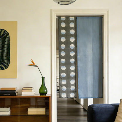 alternate angle of Polka Dot Linen Noren — Grey / Blue hanging as a two-panel doorway curtain