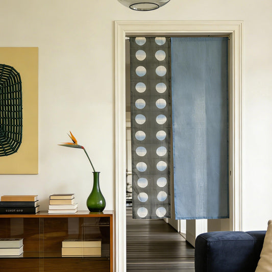 alternate angle of Polka Dot Linen Noren — Grey / Blue hanging as a two-panel doorway curtain