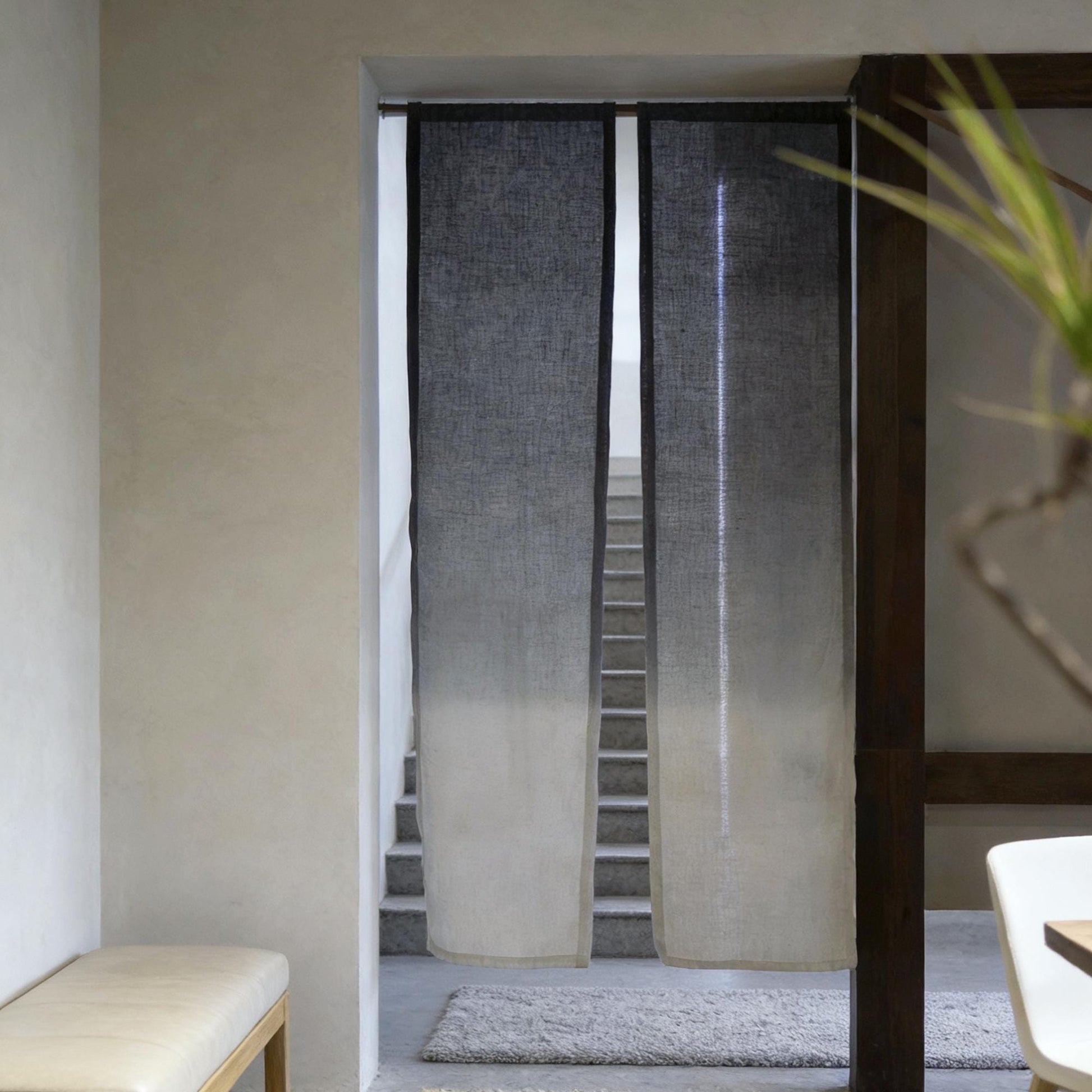 alternate angle of Soft Tone Noren — Ink Grey hanging as a two-panel doorway curtain