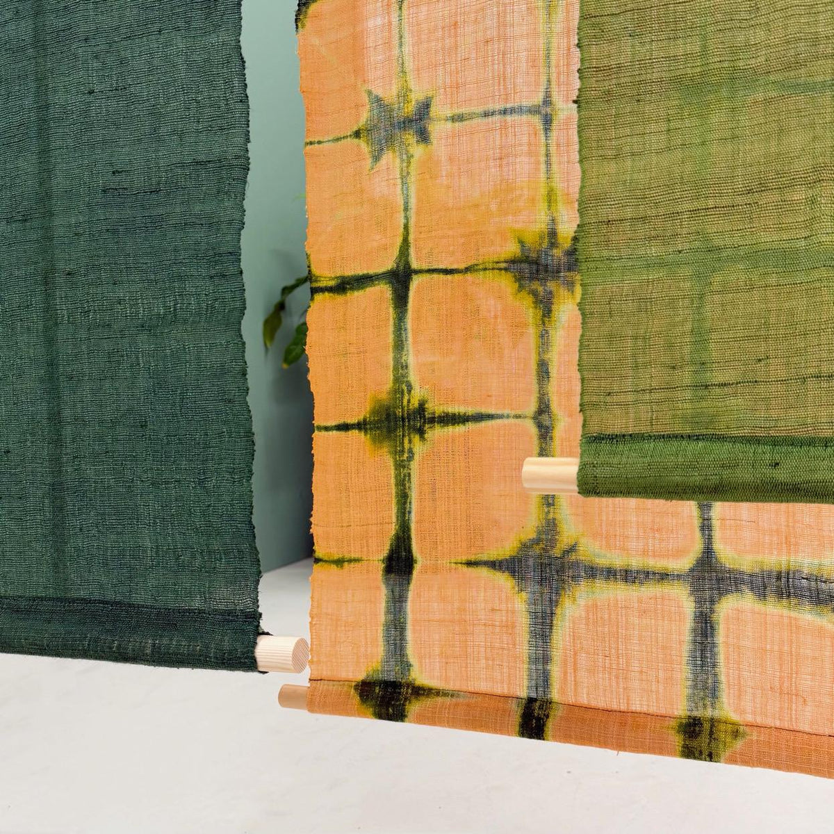 styled interior scene with Ramie Cloth — Teal Beige used as a curtain or screen