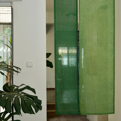 styled room scene with Soft Tone Noren — Leaf Green used as a window or doorway curtain