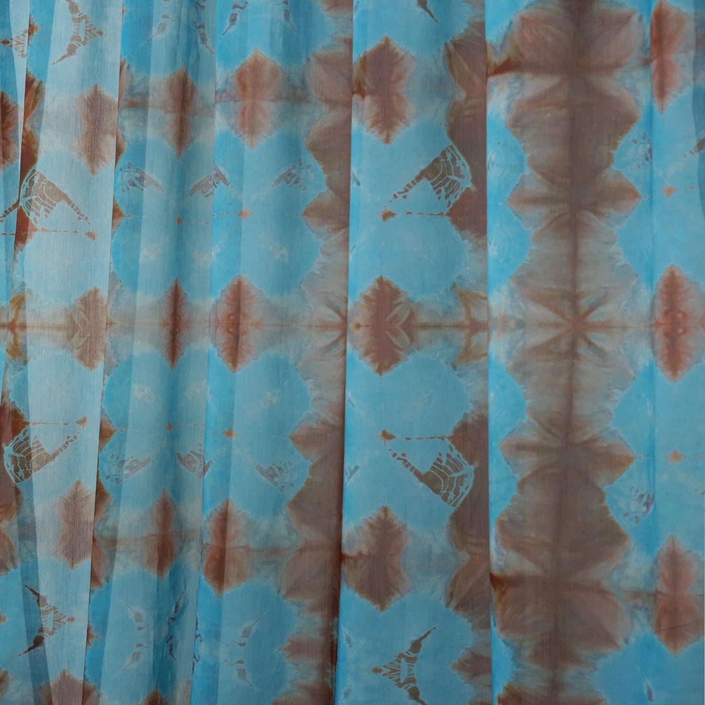 Pattern Drapery — Red Blue dressing tall windows in a styled living room