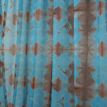 Pattern Drapery — Red Blue dressing tall windows in a styled living room