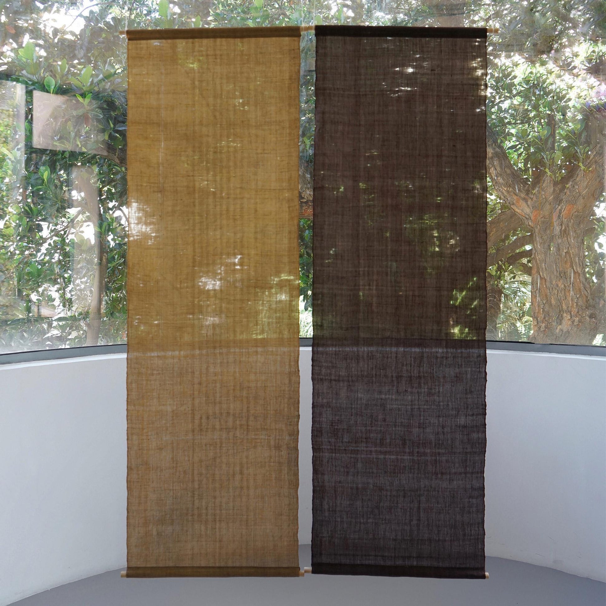 room scene featuring Ramie Ombre — Plum Grey hung by a window or doorway