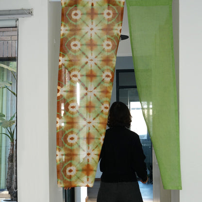 alternate angle of Motif Linen Noren — Green Bloom hanging as a two-panel doorway curtain