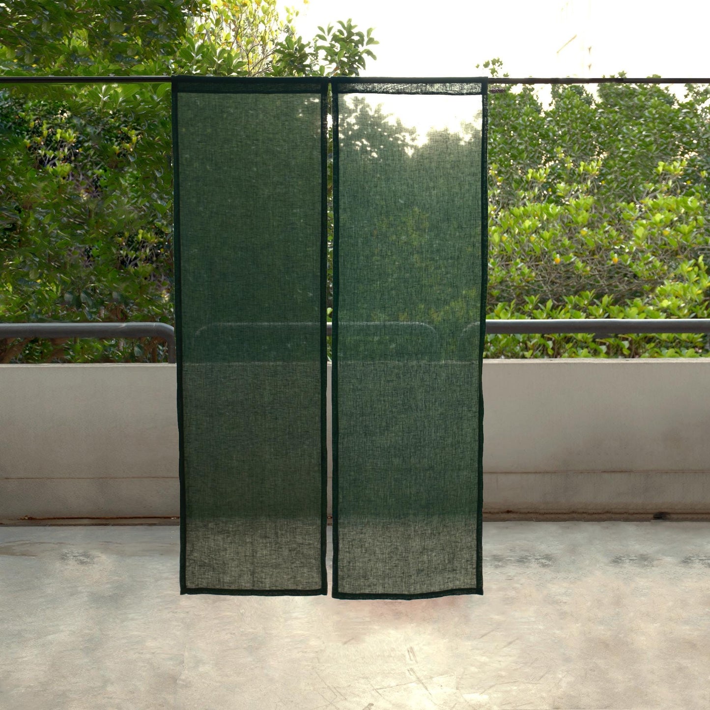 alternate angle of Soft Tone Noren — Sage Green hanging as a two-panel doorway curtain