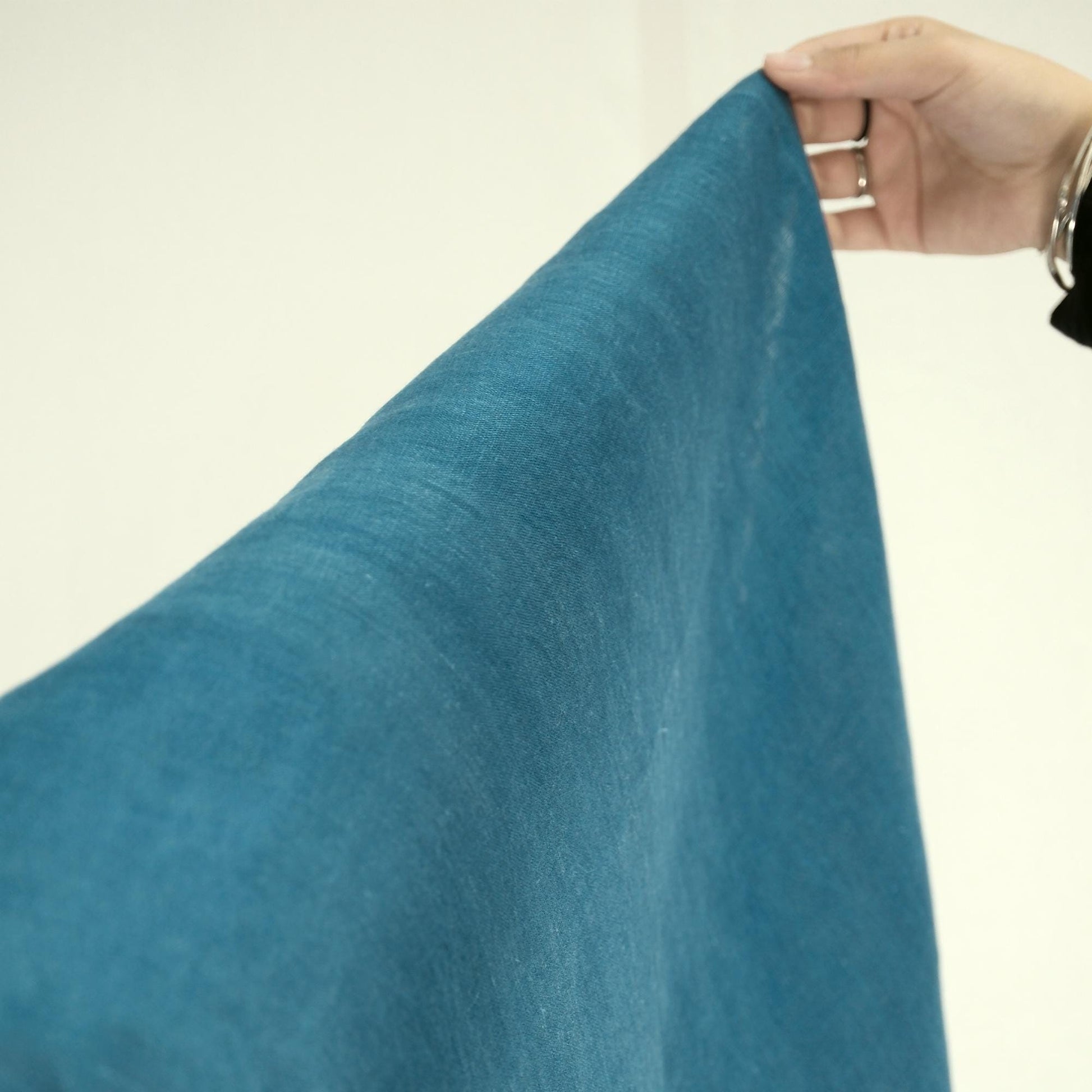 alternate angle of Soft Tone Noren — Mist Blue hanging as a two-panel doorway curtain