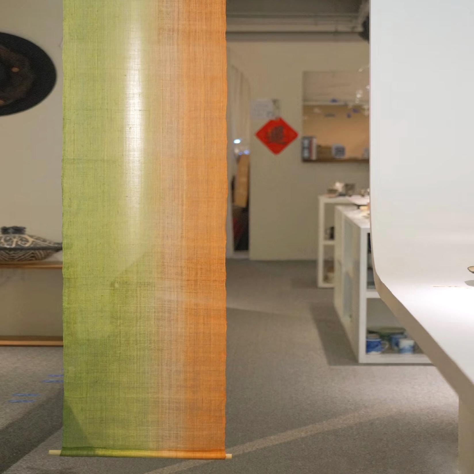 detail view of Ramie Ombre — Olive Haze showing plant-dyed fabric texture