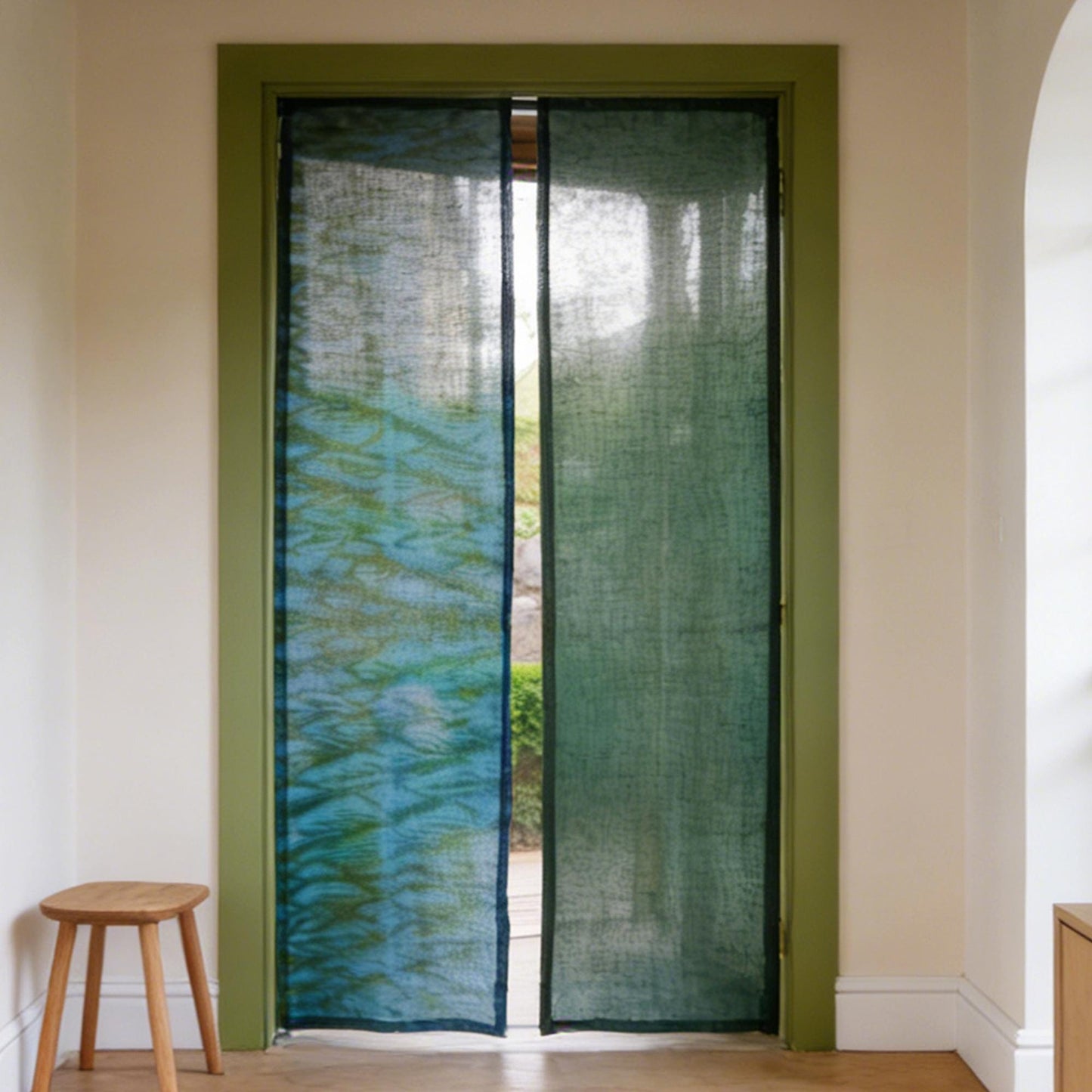 Plant-dyed linen noren 'Wave' — handmade Japanese doorway curtain with botanical motif.