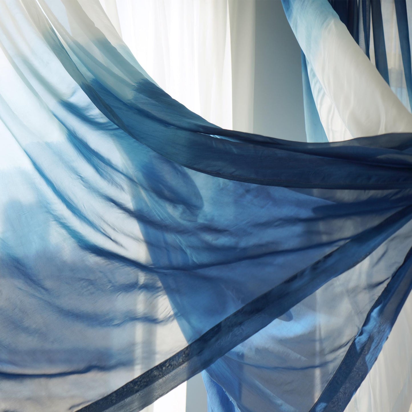 Sheer Curtain — White Blue hung as window curtains in a bright room