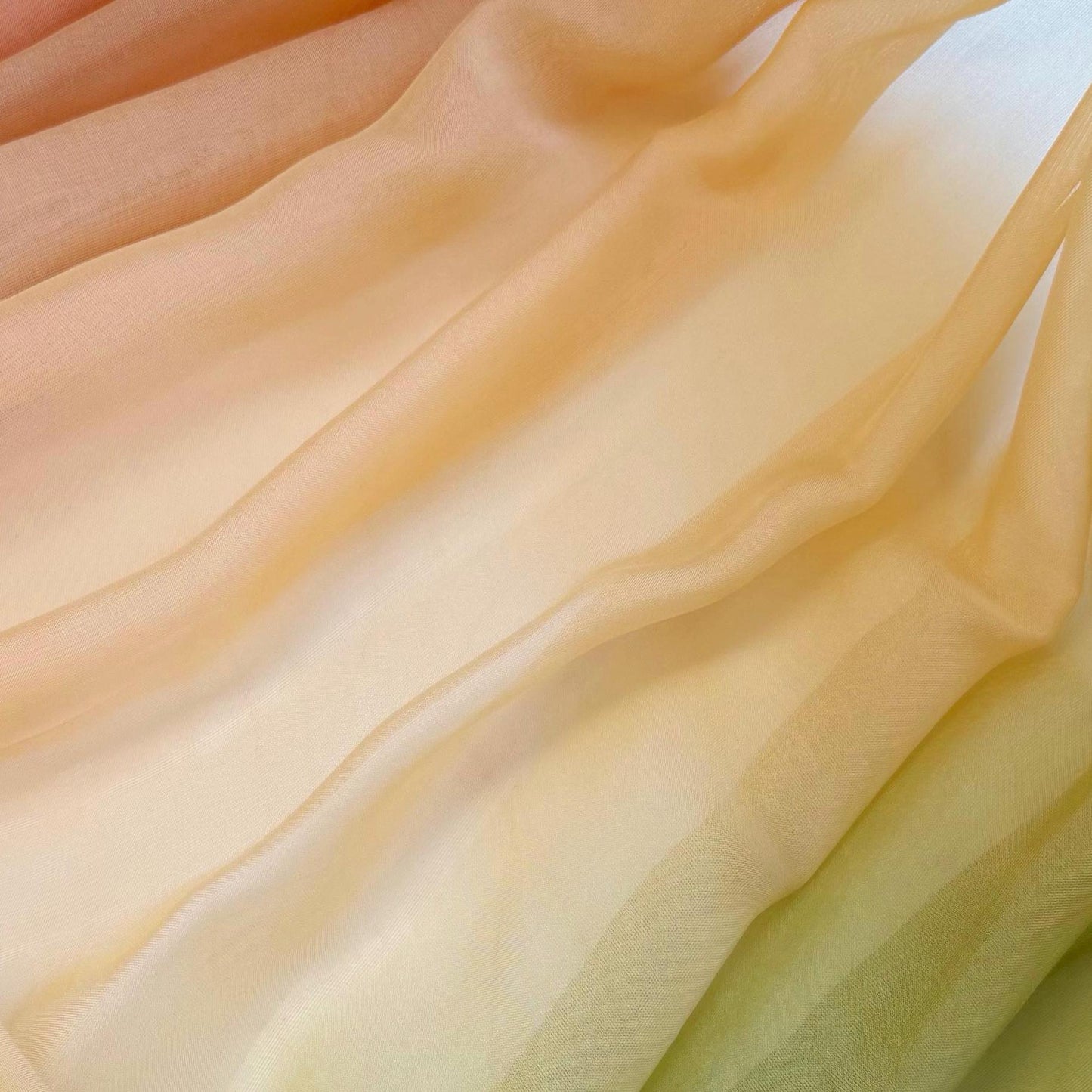 Sheer Curtain — Orange Green shown in a bedroom or living room setting