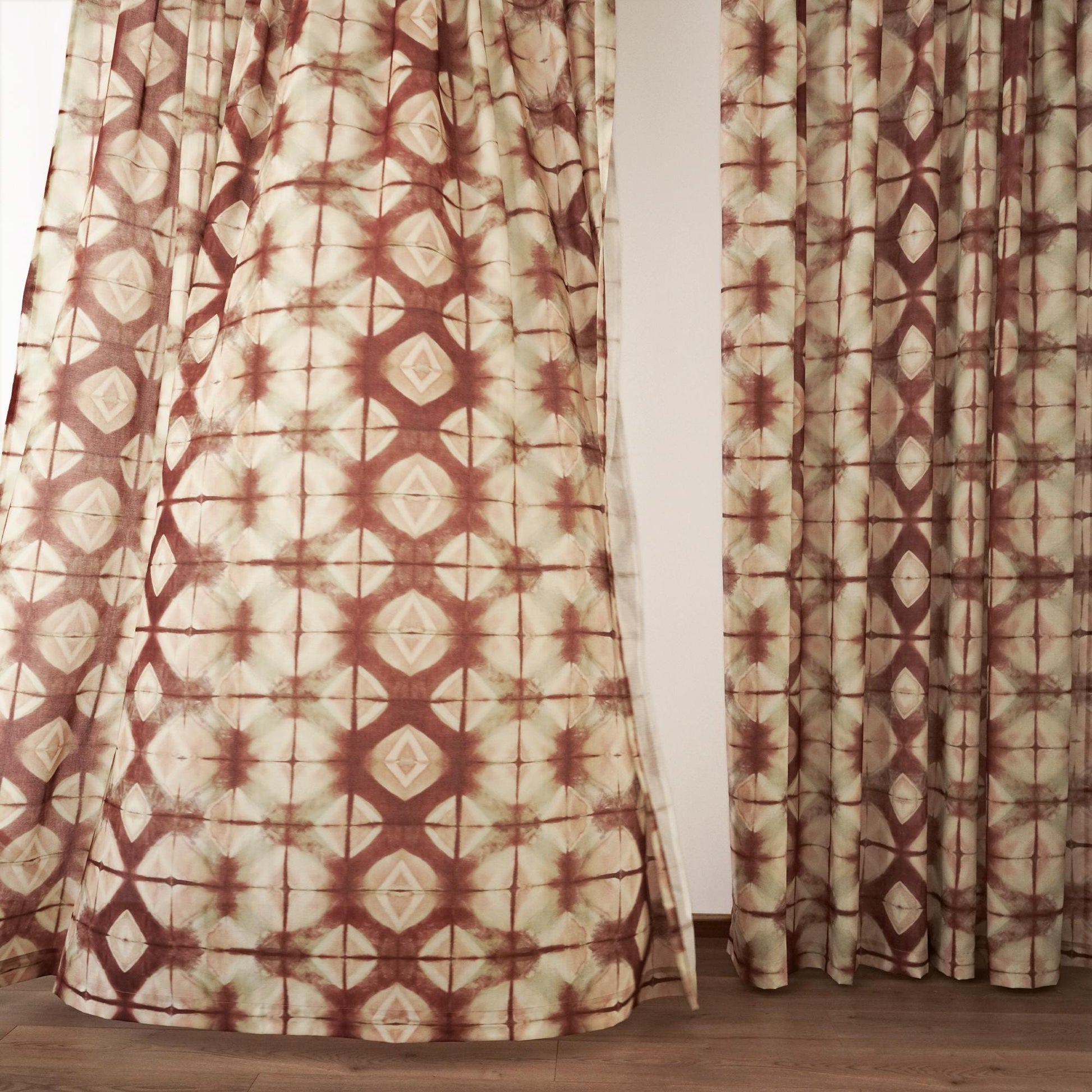 detail view of Pattern Drapery — Dusty Rose showing plant-dyed pattern and sheer drape