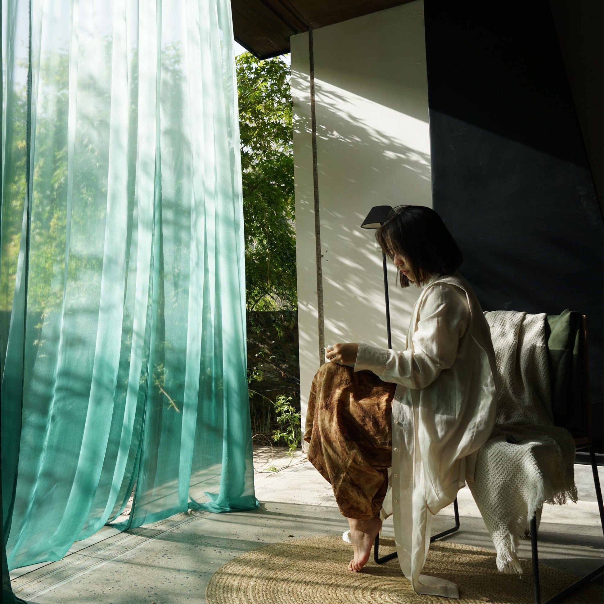 detail view of Sheer Curtain — Emerald Blue showing natural ramie texture and color