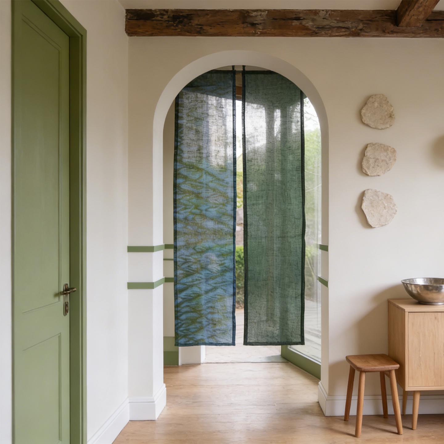 alternate angle of Motif Linen Noren — Wave hanging as a two-panel doorway curtain