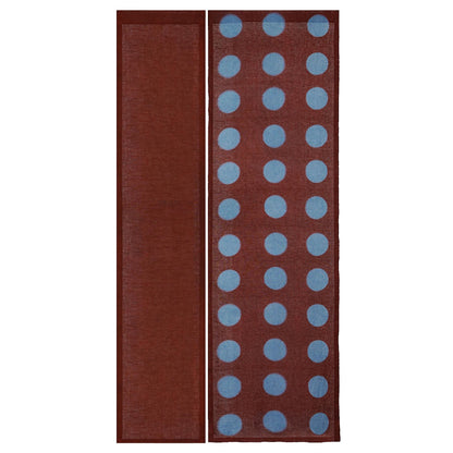 alternate angle of Polka Dot Linen Noren — Brick / Red hanging as a two-panel doorway curtain