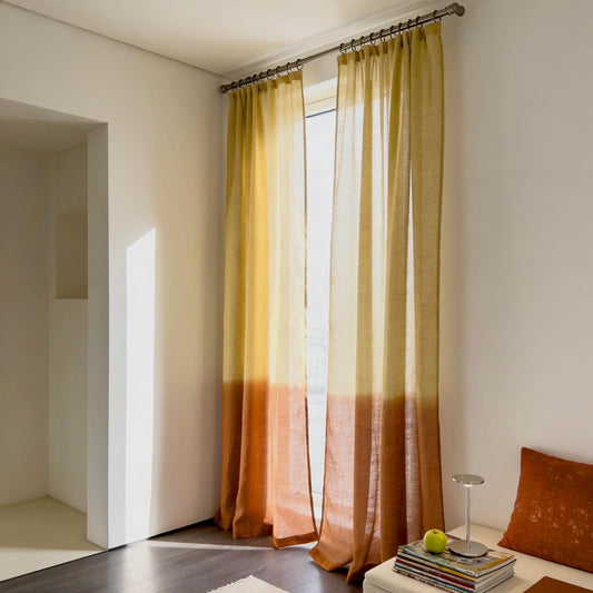 Linen Panel — Warm Beige hanging by a window, filtering daylight in a styled interior