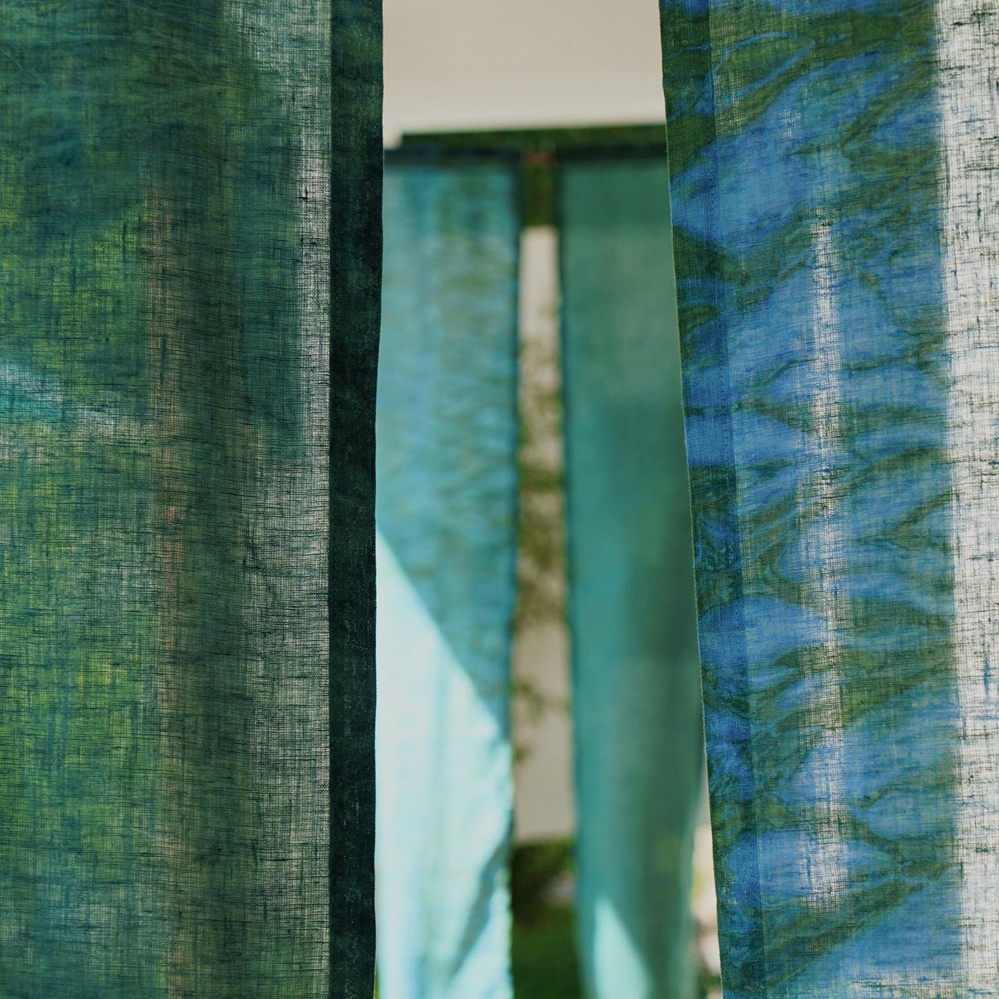 close-up of Motif Linen Noren — Wave showing the natural resist-dye motif on linen