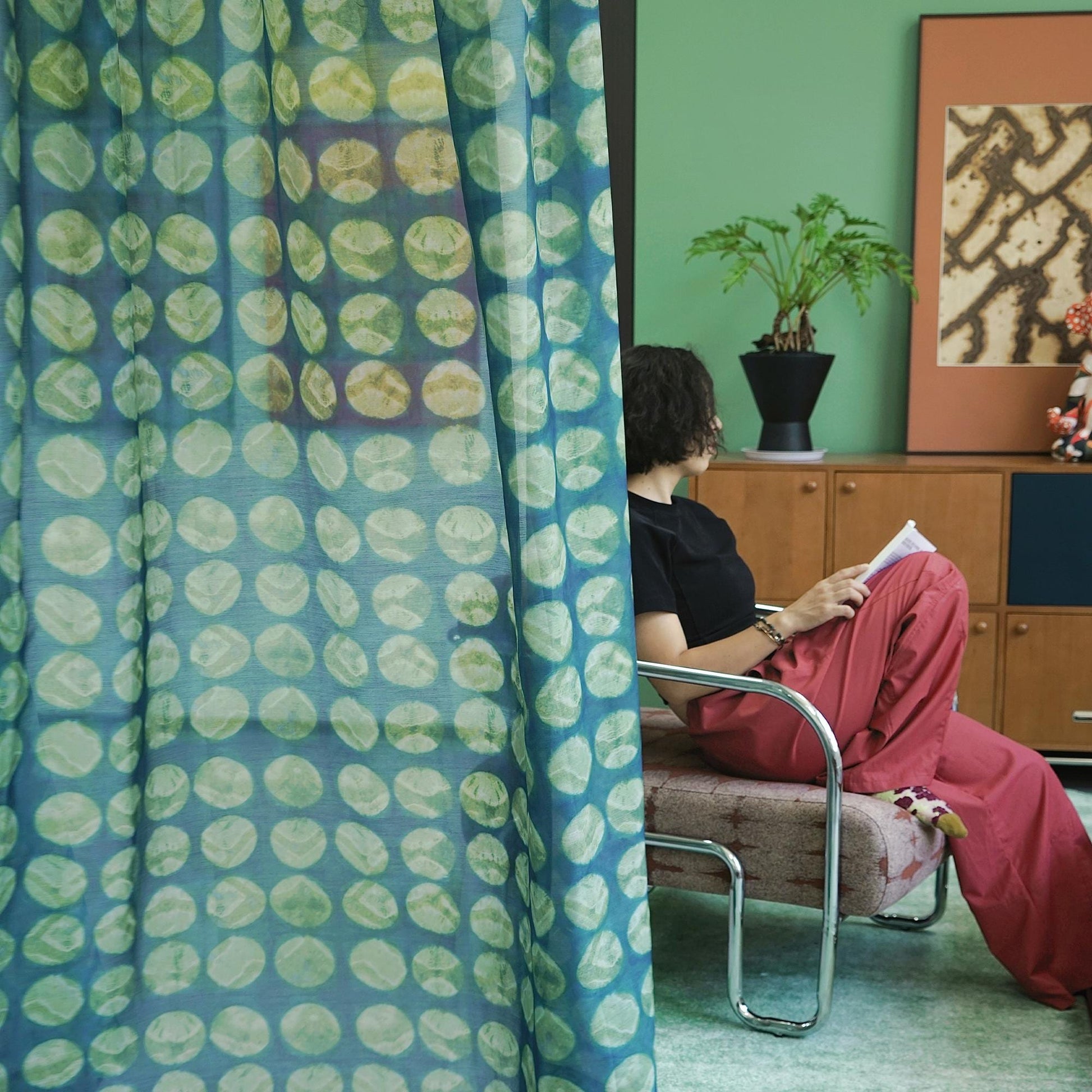 Pattern Drapery — Green Ochre shown in a bedroom interior with soft natural light