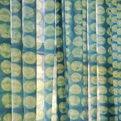 Pattern Drapery — Green Ochre dressing tall windows in a styled living room